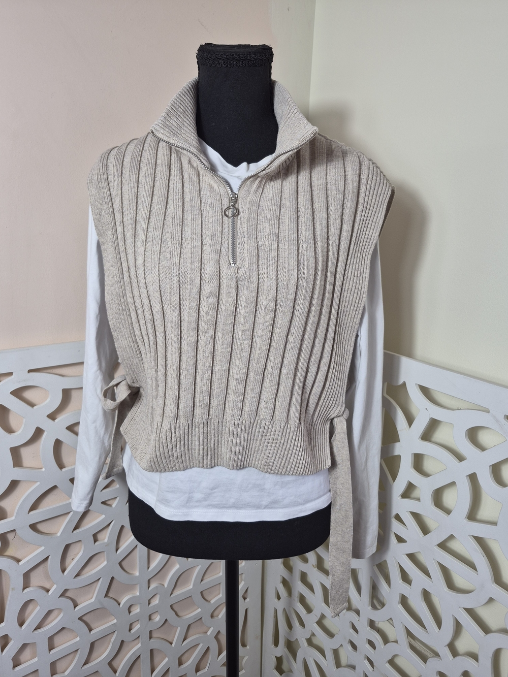 Layered quarter zip ribbed knit sweater vest with white turtleneck top open side